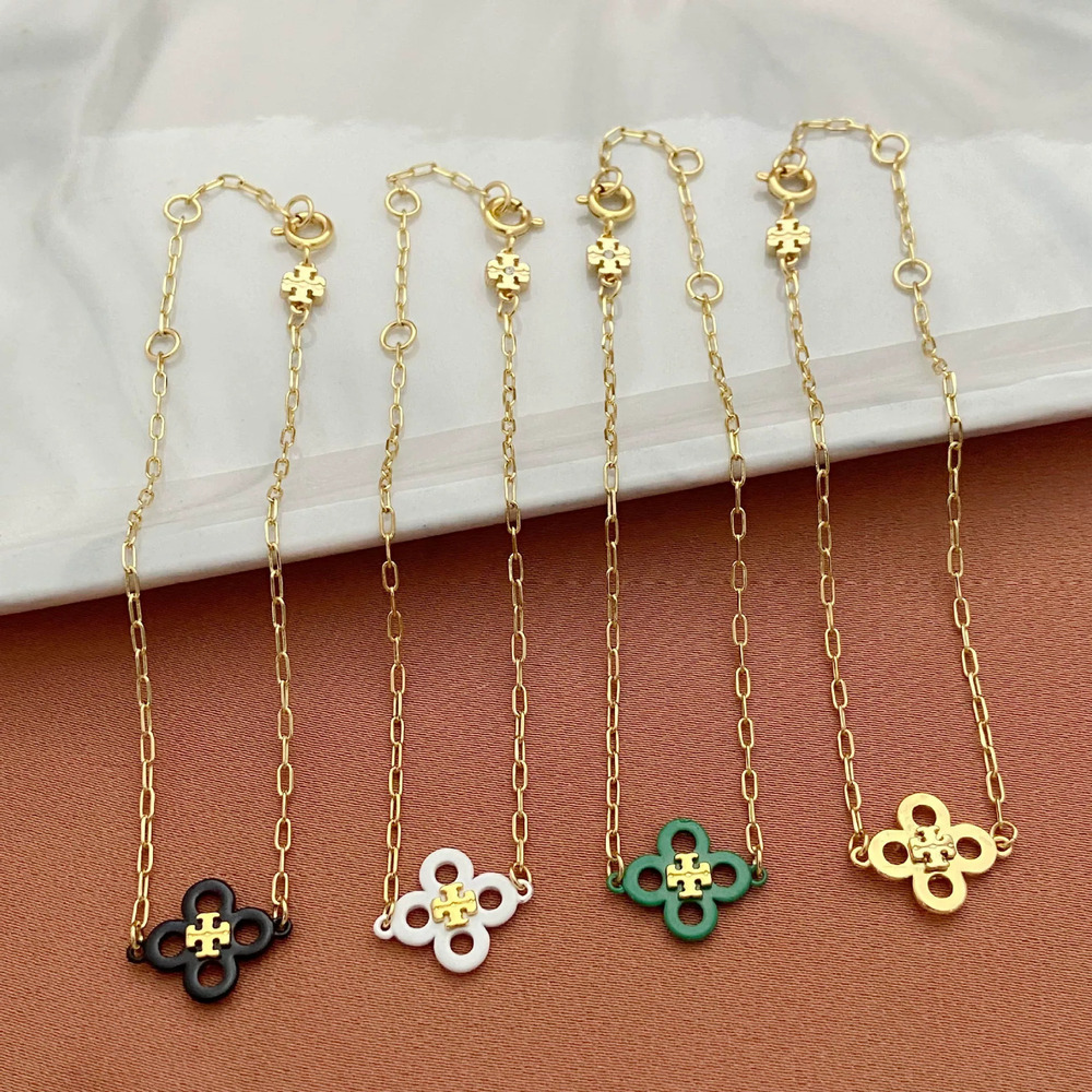 Tory Burch Hollow 4 Leaf Clover Metal Bracelet